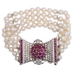 Retro Diamond and Ruby Bow Four Strands of Cultured Pearl Bracelet