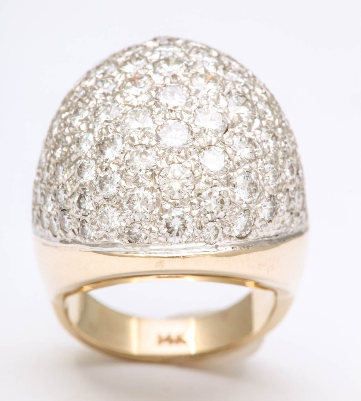 Not a simple Dome Ring but a Large Diamond Ring -  Pave set  with  Full cut - clean & white Diamonds .  Can be used as a pinky ring or 4th finger Dome Ring. 
 Almost 5cts.