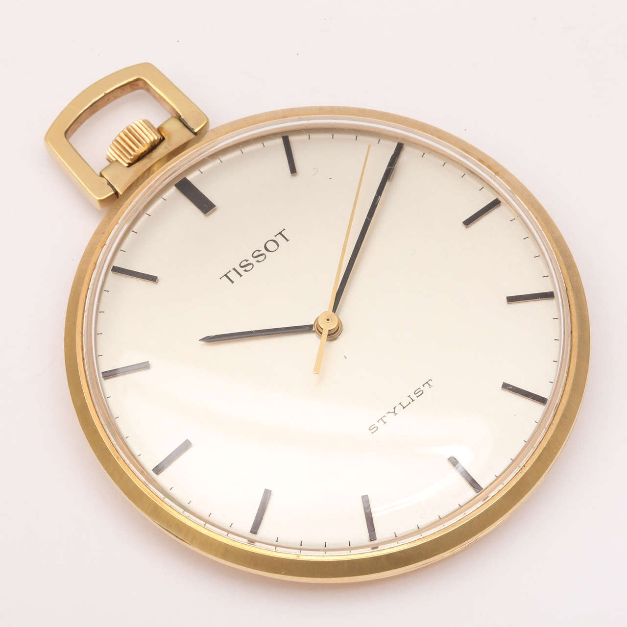 Tissot 18k yellow gold plated Stylist pocket watch, with sweep center seconds and baton markers.