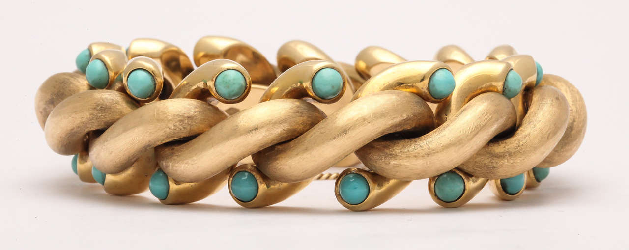 Magnificent 18kt Yellow Gold - matte & polished link Bracelet with Persian Turquoise terminals.   Self closing with a hinged link.  Ultra chic - and an unusual combination. Height of 