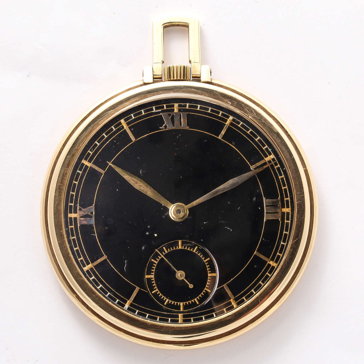 Jaeger-LeCoultre 18k Yellow Gold Pocket Watch with Black Dial with Roman Numerals. Subsidiary seconds. Circa 1940s.