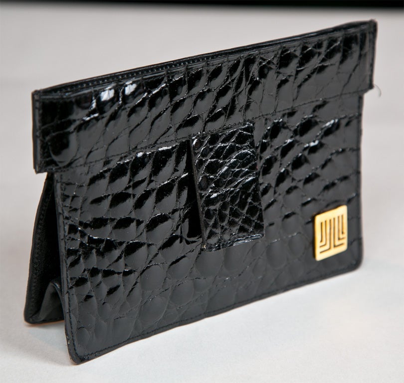 From funkyfinders is this black alligator card case which double as a small. the front features a gold 'JL' lanvin logo and the interior is black leather, signed 'Lanvin''Paris'. beautifully made with 2 tabs for easy access.