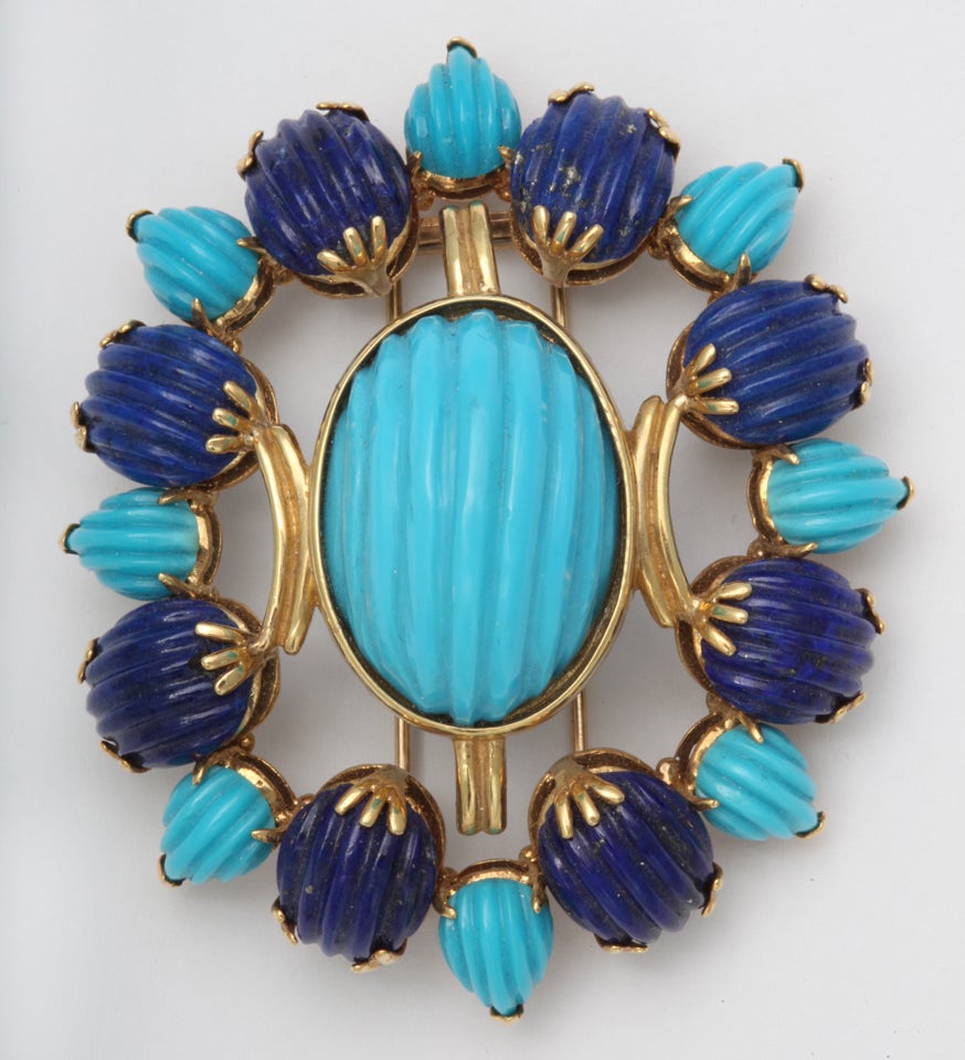 Large clip Brooch in  Egyptian Revival Style in carved Turquoise & Lapis imitating Faience.  Set in 18kt Yellow Gold.  Very bold  and colorful