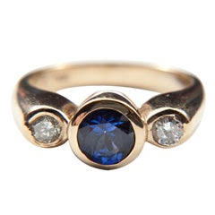  White  Gold Ring With Sapphire And Two  Diamonds