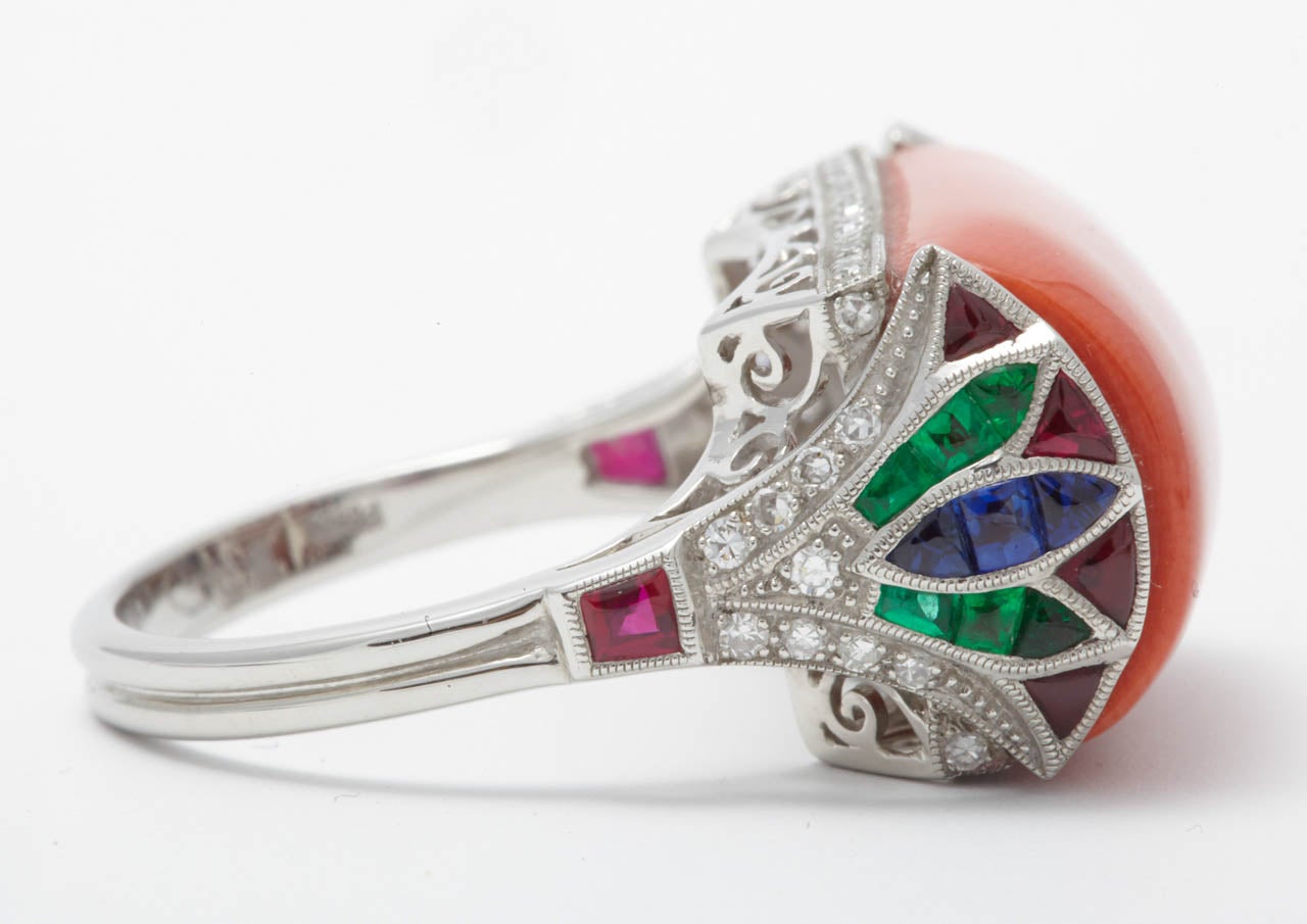 Art Deco A Coral, Calibré Cut Ruby, Emerald, Sapphire and Diamond Platinum Dress Ring. For Sale
