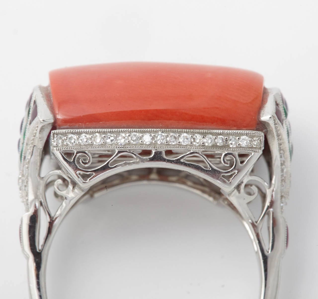 Women's A Coral, Calibré Cut Ruby, Emerald, Sapphire and Diamond Platinum Dress Ring. For Sale