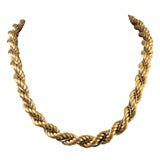 Yellow and white gold torsade necklace
