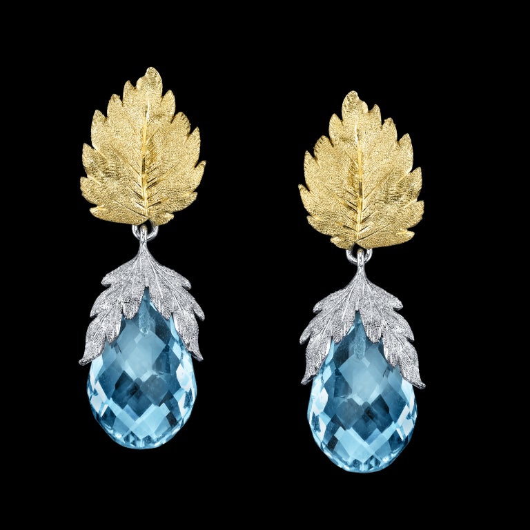 18K yellow and white gold earrings, entirely hand engarved in the traditional 