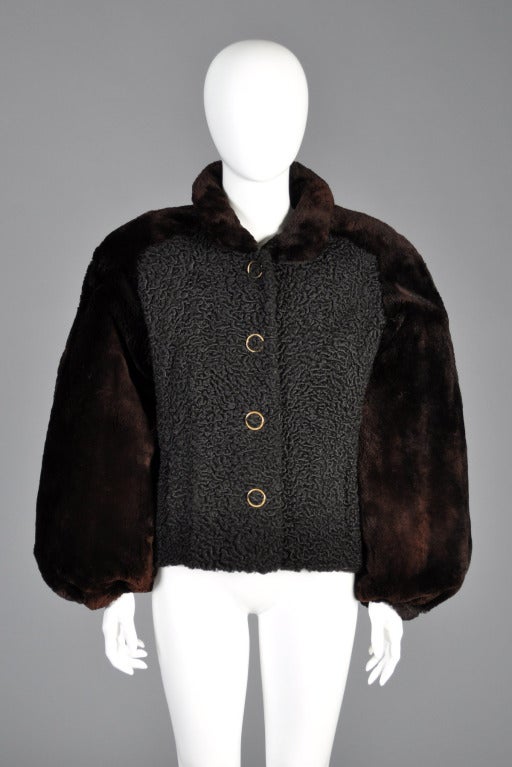 Incredible 1980s Givenchy Haute Fourrure persian lamb coat with massive sheared beaver blouson sleeves + shoulders. We absolutely love this 1980s take on the early 50s 