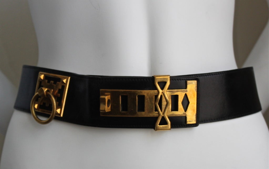 Navy blue leather collier de chien belt with special gold hardware from Hermes dating to the 1980's. Best best fits a French size 75. Made in France. Good condition.