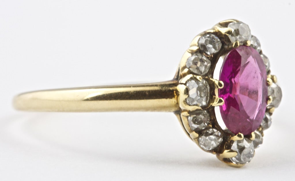 This ring from the Victorian era features a ruby accompanied by a GIA certificate stating that it is of Burmese origin with no indications of heating or treatment. The antique ring is of 18k gold  with 12 old euro and old miner diamonds.

Ring