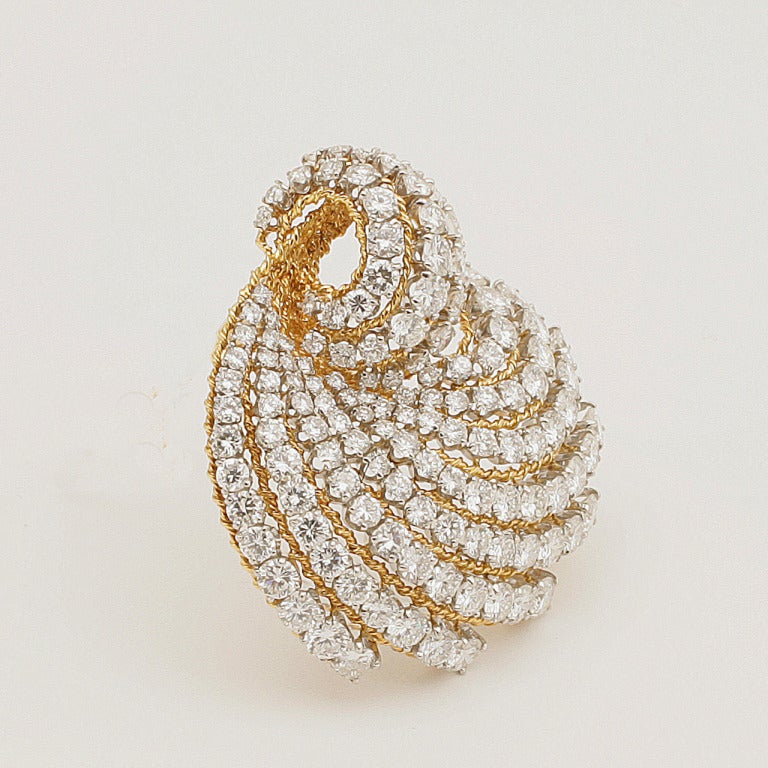 Van Cleef & Arpels Mid-20th Century Diamond and Gold Platinum 'Swirl' Brooch In Excellent Condition In New York, NY