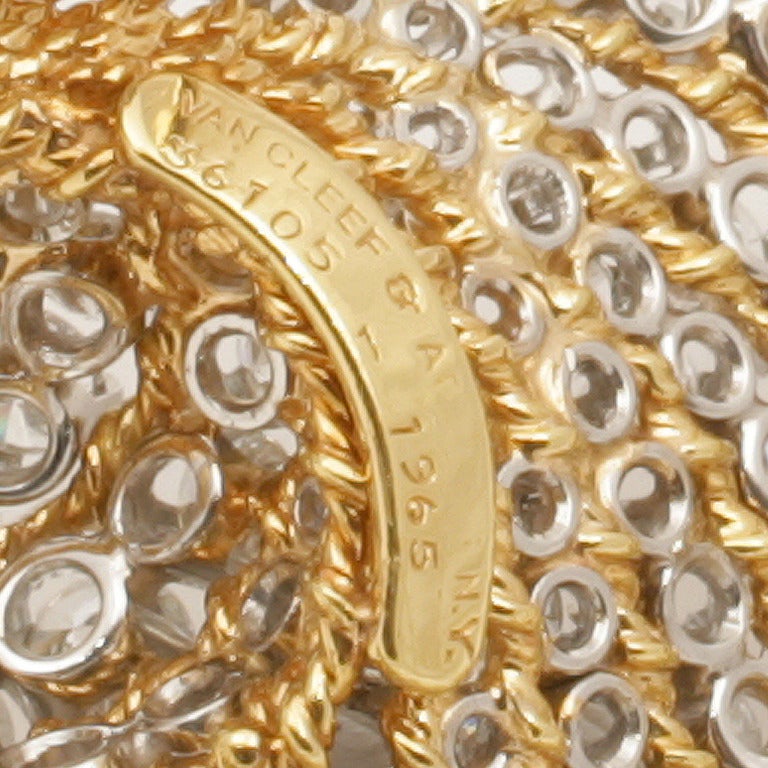 Women's Van Cleef & Arpels Mid-20th Century Diamond and Gold Platinum 'Swirl' Brooch