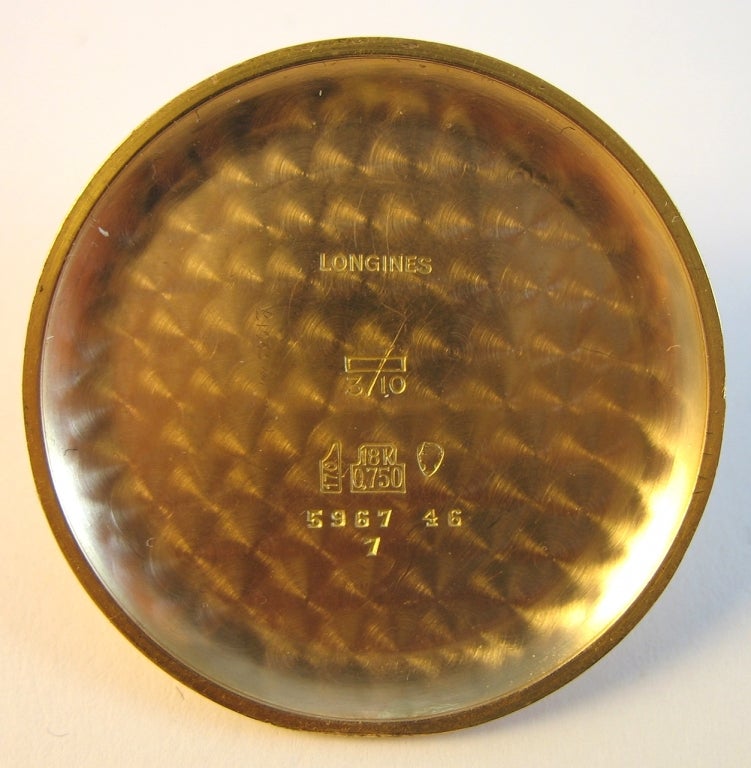 Signed Longines, Ref.5967 46, Movement NO.12229737, Manufactured In 1960ca
Cal. 30CH mechanical movement,the nickel plated movement jewelled to the centre with gold alloy balance, the brushed silvered dial with raised pink Arabic and triangular