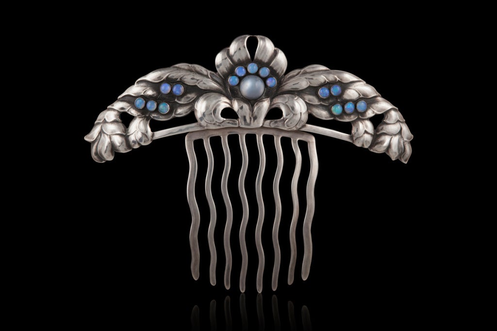 A first period (1904-1908) Georg Jensen hair comb, design #45 by Georg Jensen. This is without hesitation the best hair comb we have ever had.