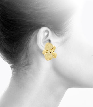 Beautiful orchid design in 18K yellow gold by Angela Cummings. Stamped 18K Cummings. The earrings are clip on for non pierced ears.