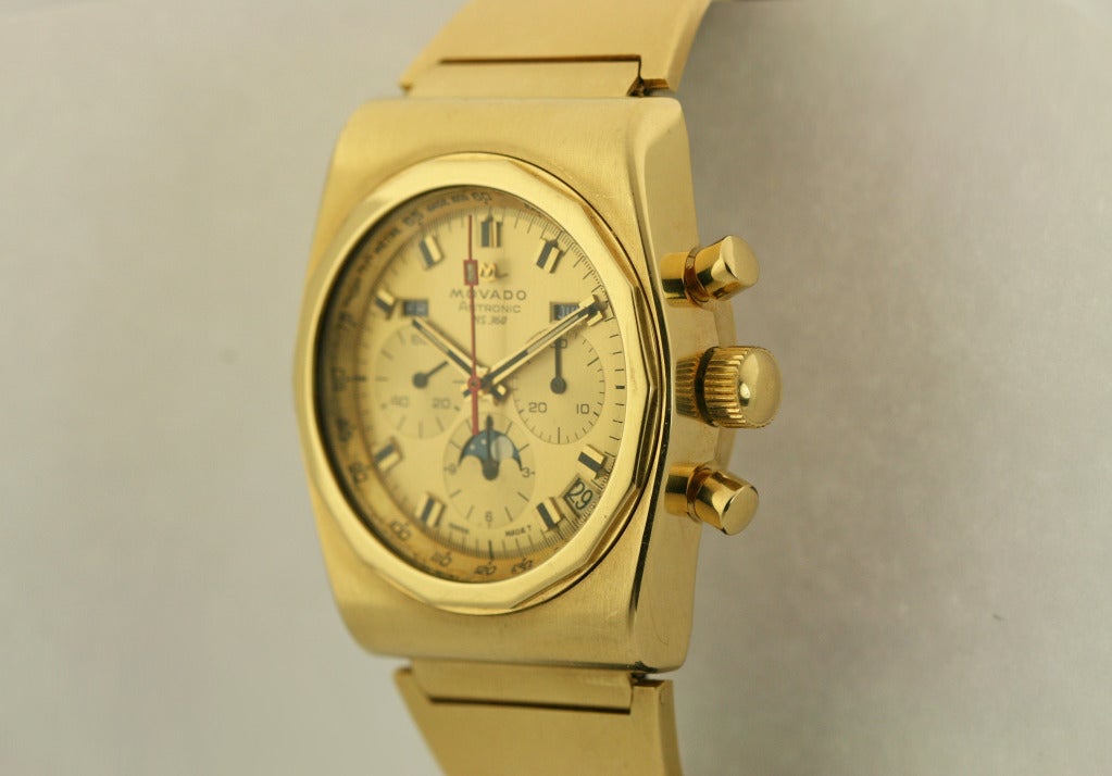 This is an extremely rare Movado Astronic HS360 in 18k yellow gold. This watch is typically made in steel and very difficult to find one in 18k yellow gold. The watch features a triple date calendar moonphase chronograph and is powered by Zenith's