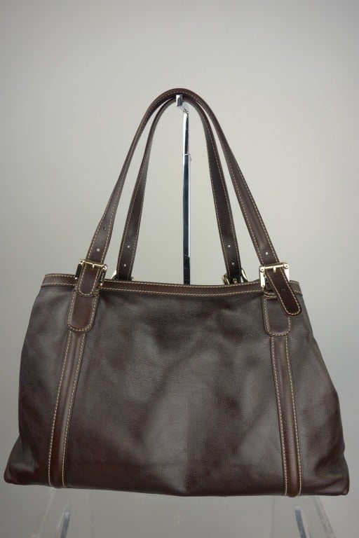 Gucci brown leather handbag.