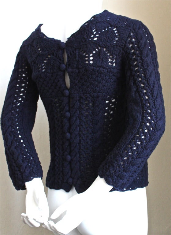 Unusual navy blue hand-knit sweater with bra detail and knit buttons up back from Comme Des Garcons Tao dating to 2005. Size S. Approximate measurements: 13
