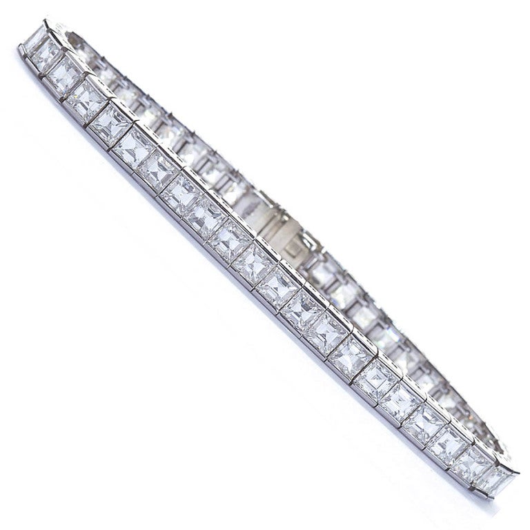 Diamond tennis bracelets abound. The craftsmanship on this one is unlike any other, most probably because it was created when hand craftsmanship was not yet a lost art. The links move velvety soft as is the feel of the metal on your hand.