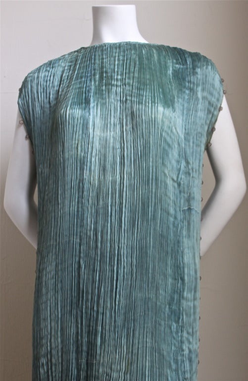 Phenomenal pale turquoise pleated silk 'Delphos' gown with clear Venetian striped glass beads from Mariano Fortuny dating to the 1930's. Dress is approximately 55