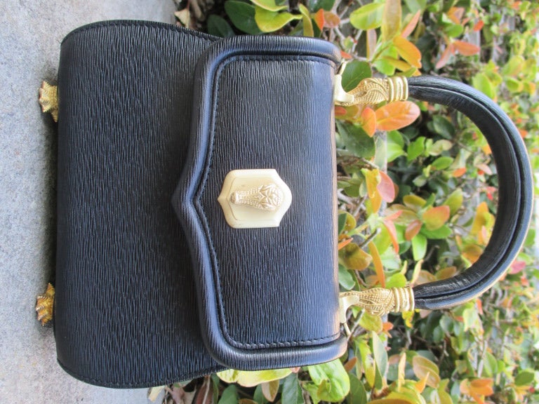 Barry Kieselstein-Cord Rare Black Mini Trophy Bag

Comes with detachable shoulder strap

6 1/2