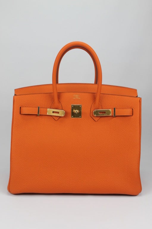 Hermes handbag
Birkin size 35 , Togo Leather and Gold hardware, Orange
Purchased on April 2014
Original Invoice and packaging
Shipment and Insurance Included 
100%  Safe 
    1. Sold by company with invoice,
    2. Secured payment to the