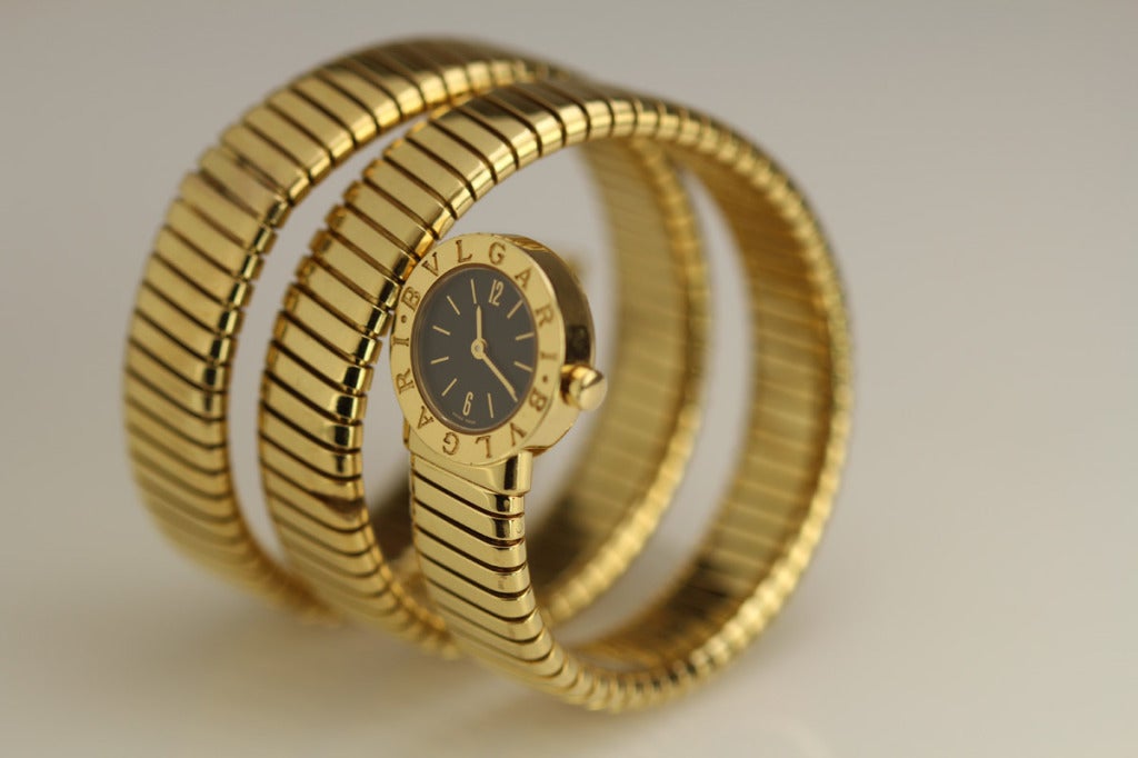 Bulgari Lady's Tubogas wrap style bracelet with quartz watch.