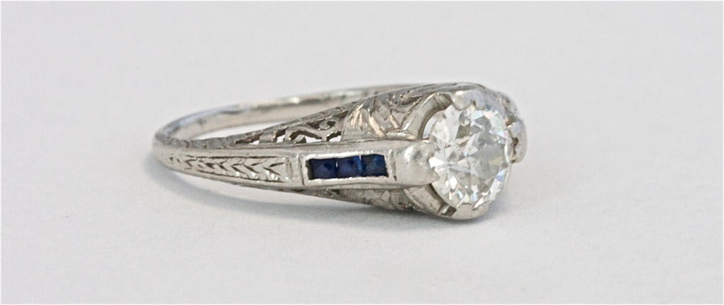 An exceptionally well priced Art Deco engagement ring. The old European cut diamond is approximately 0.75 carats and is white and lively. 

Ring size 5 1/2 and can be re-sized.