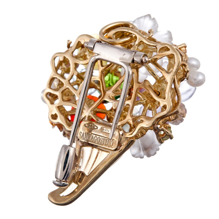 18k yellow gold & "Cornucopia" of flowers, made of carved and faceted gemstones, pearls and coral; a sweet addition to any lady's lapel!