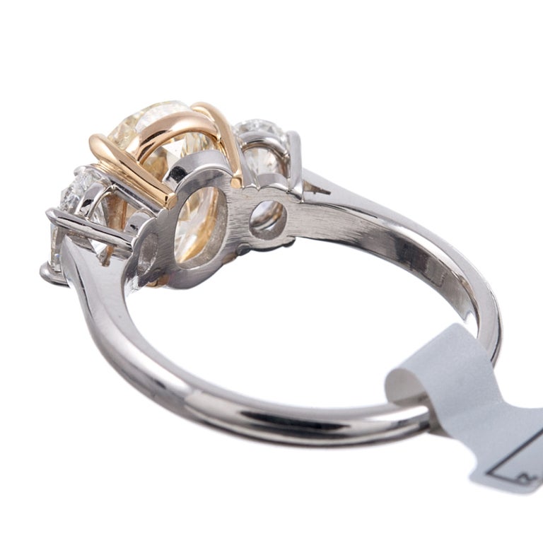 Women's 2.54Ct Fancy Yellow Diamond and White Diamond Three Stone Ring