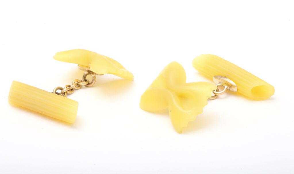 These fantastic cufflinks are actually carved from yellow agate, but they do look like the real thing.  The front features 