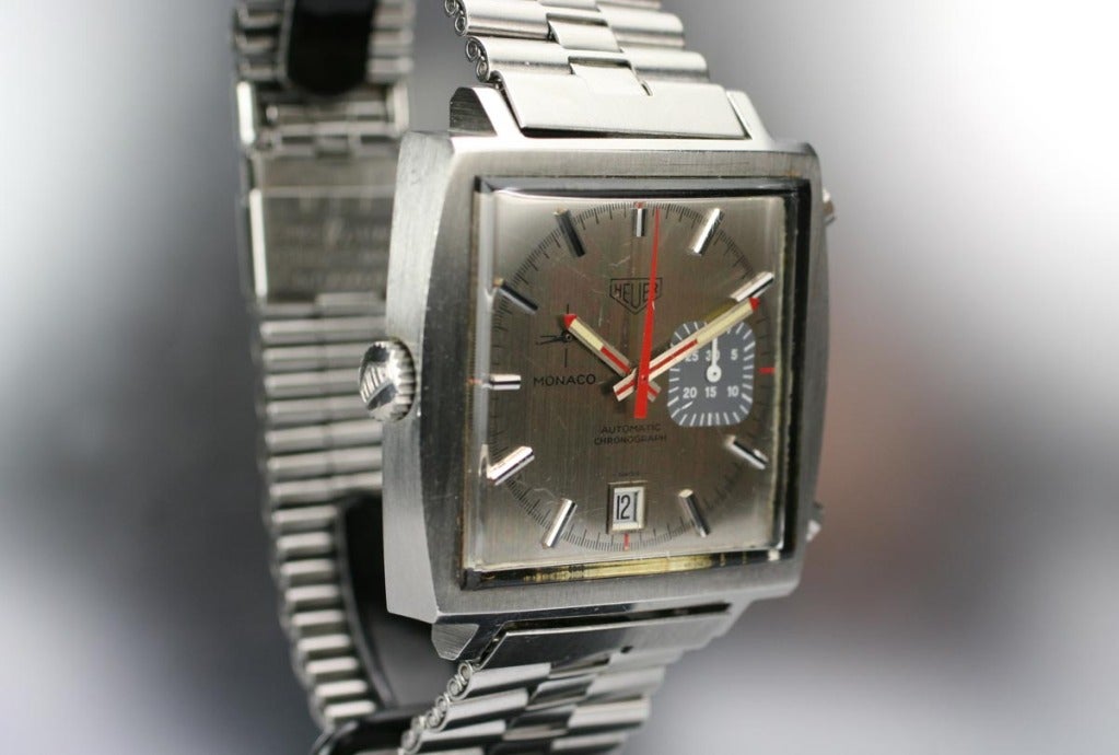 This is an original 1970s Heuer Monaco with an original grey dial with an unusual configuration. It is the reference 1533b and has a calibre 15 movement. This is an automatic version and quite rare with this dial combination. It comes on an original