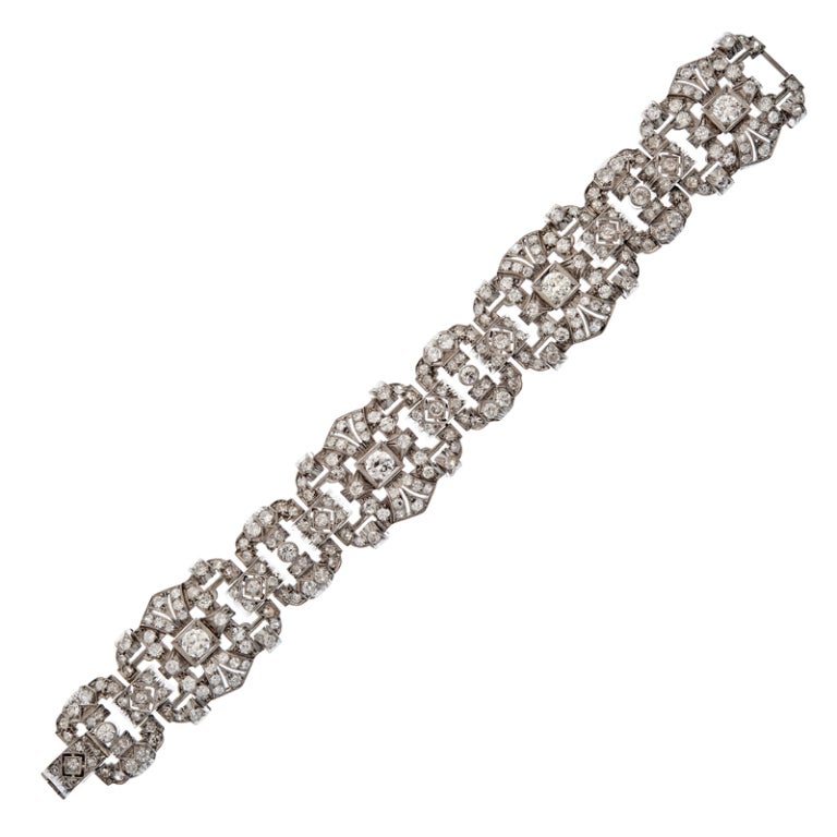 Impressive hand made art deco platinum bracelet containing approximately 11.5 carats of old European an single cut diamonds. Abundant with classical art deco design and detail, this is the epitome of such an important piece which will make a proud