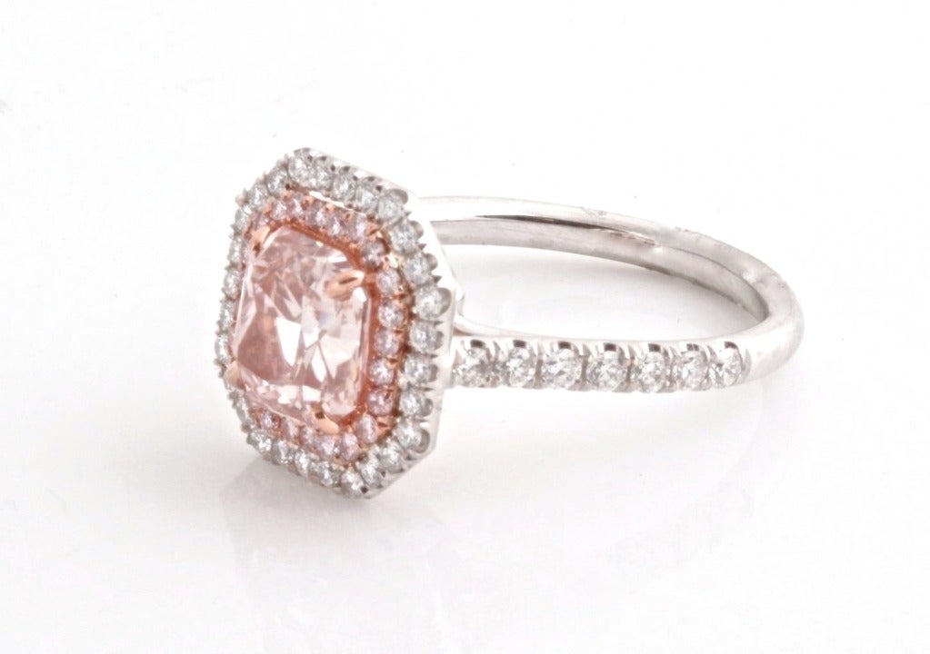 Follow us on Twitter at twitter.com/MatterCA

This is a showstopper of a ring. A terrific color, a gorgeous center stone, and a playful, sophisticated, fun design. It's also a great investment at the moment.

FANCY ORANGY PINK DIAMOND