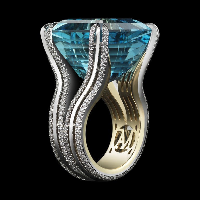 A very fine 27.24 carat Asscher- cut Intense bright blue-green Aquamarine ring set with Alexandra Mor's signature details of double bands of 1mm knife-edged wire and 1.05 carats of 1mm 'floating' Diamond melee. One of a Kind 1/1.