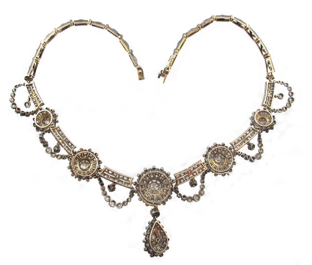 A yellow gold silver topped diamond festoon necklace. England, 1850 c.a.