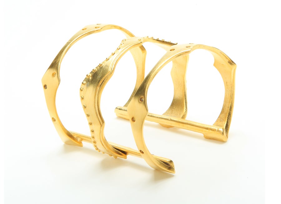This exquisite piece of our Summer 2012 collection is Goddess Artemis' Cuff. The Virgin Goddess of the Sun & Moon, Artemis is the Greek Goddess of the Hunt,symbolizing the stamina and beauty of female mind & heart with the power and wisdom of