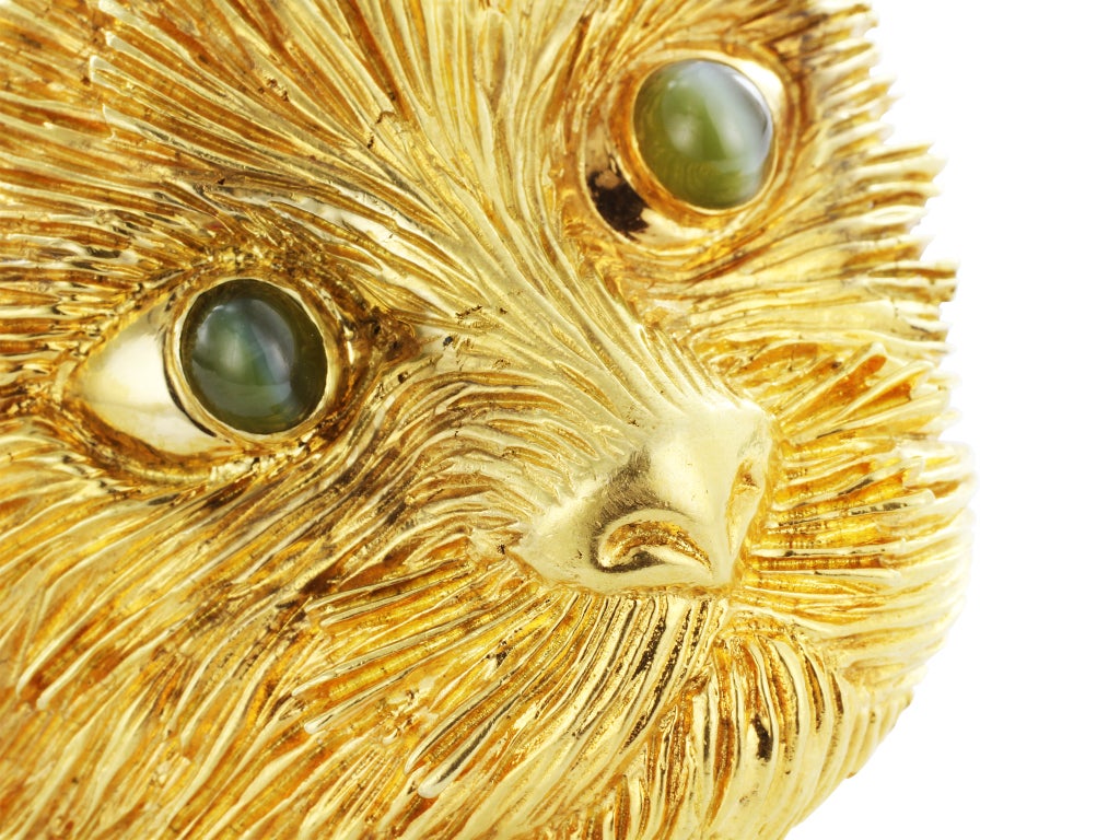 Vintage 18 karat yellow gold cat pin with Chrysoberyl cat's eye for the eyes, signed Tiffany & Co circa 1960's.