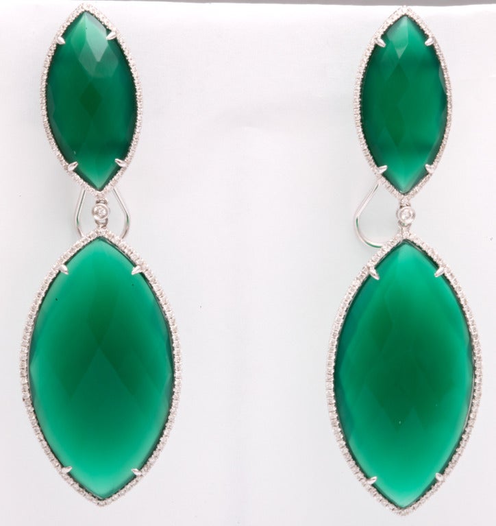 Deep green agate drop earrings flanked with approximately 3 carats of diamonds, in white gold.