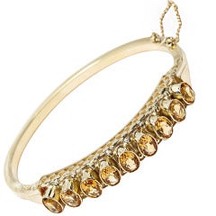 A yellow golden closed forever citrine bracelet