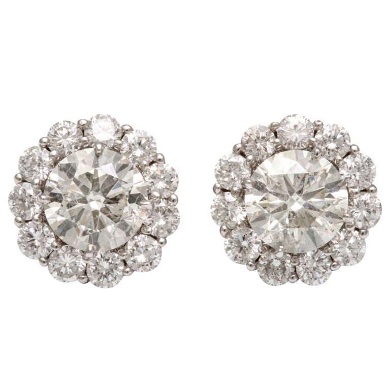 Bold Diamond Stud Earrings with Diamond Jackets For Sale