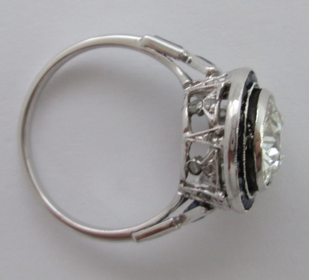 An early 20th Century Platinum, Diamond and Sapphire cluster Ring 1