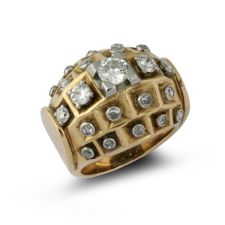 RENE BOIVIN. A Diamond Yellow Gold Ring.