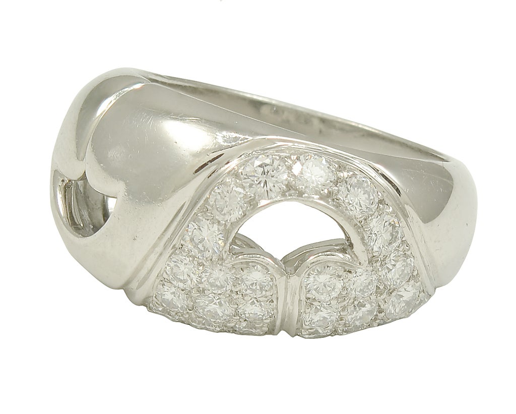 An enchanting Bulgari ring that is made of 18k white gold set with diamonds in an intriguing 