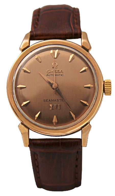 Rare and highly collectible Omega Seamaster commemorating the 1956 XVI Olympic Summer Games in Melbourne. 18k Yellow Gold, Automatic