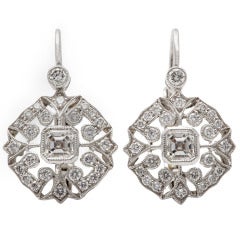 A pair of fiiigree diamond white gold ear pendants
