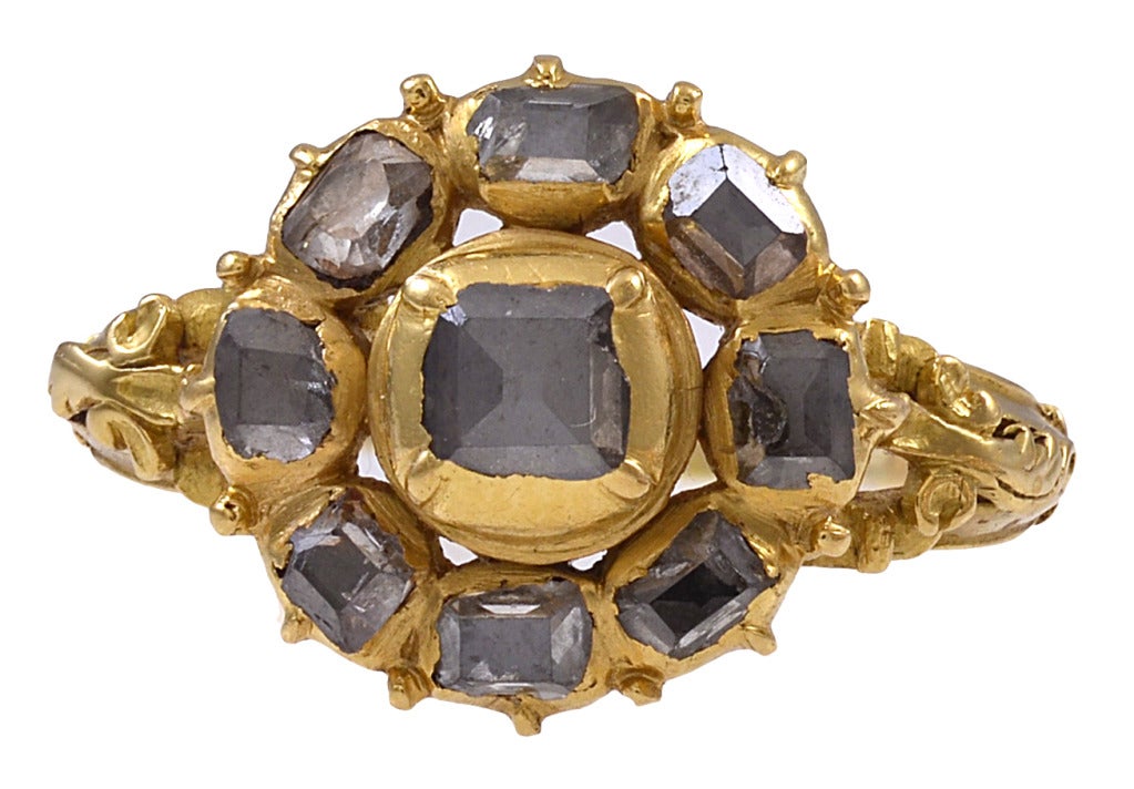 Rare 17th century table cut diamond ring in an 18K gold basket setting. The amazing details accentuate the beauty of the ring which is a size 9.5 and can be sized.