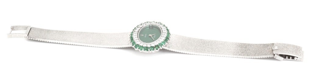 This is a spectacular watch from Rolex. The diamonds and emeralds surround the dial making this a beautiful, opulent bracelet, as well as a great watch. 

It comes with a one year warranty from the date of purchase.

WEIGHT: 60.5 grams
LENGTH: