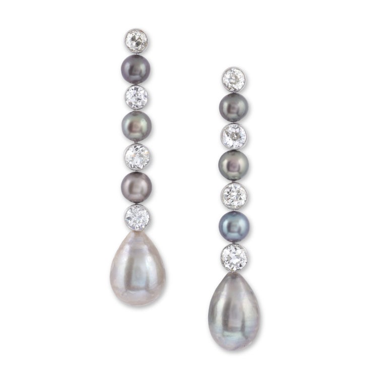 Each designed as a fancy-coloured pearl drop, suspended from a line of alternating brilliant-cut diamonds and natural coloured button pearls, Circa 2000.